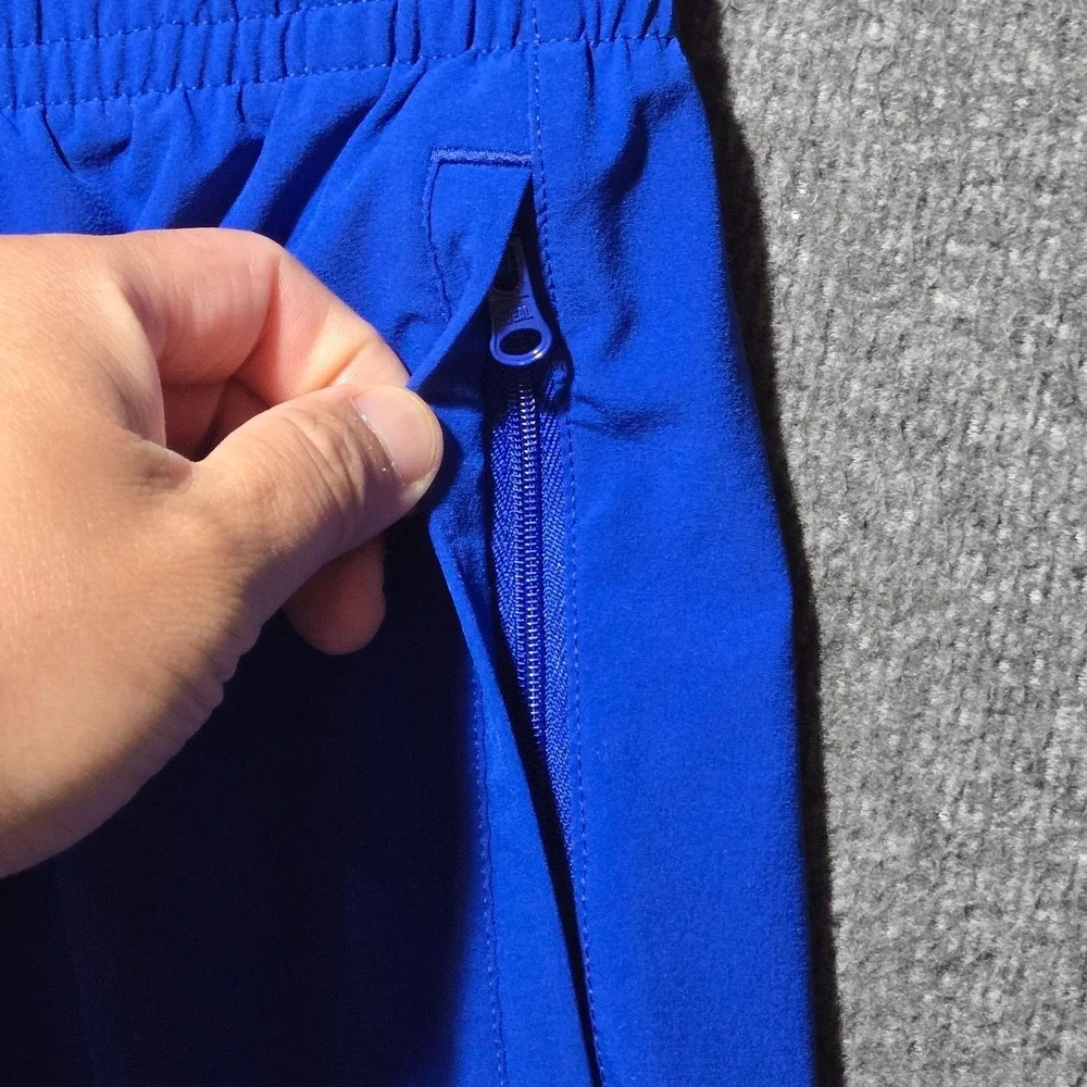 UNDER ARMOUR UA Squad Woven Warm-Up Pant 1293912‎ Royal Blue Mens L